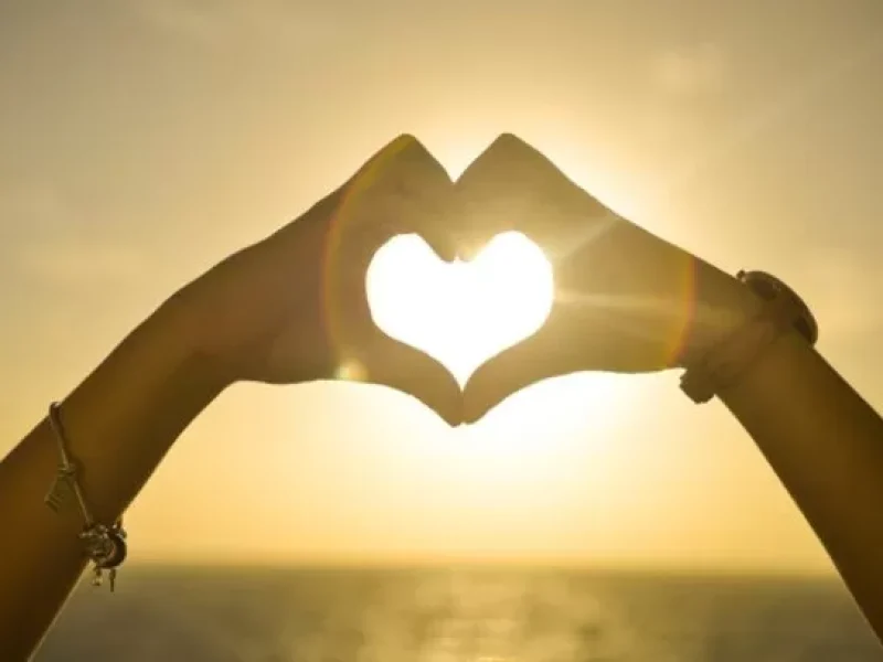 sunset-hands-love-woman-610x407